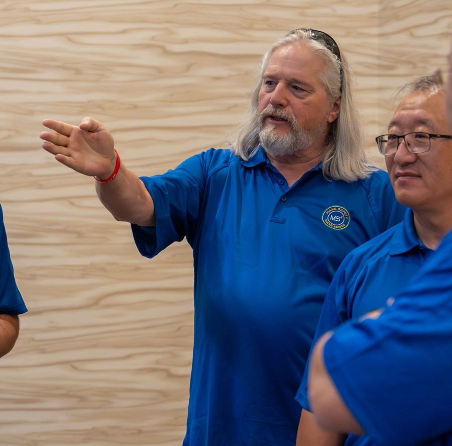 Troy King teaching a training class, September 2026