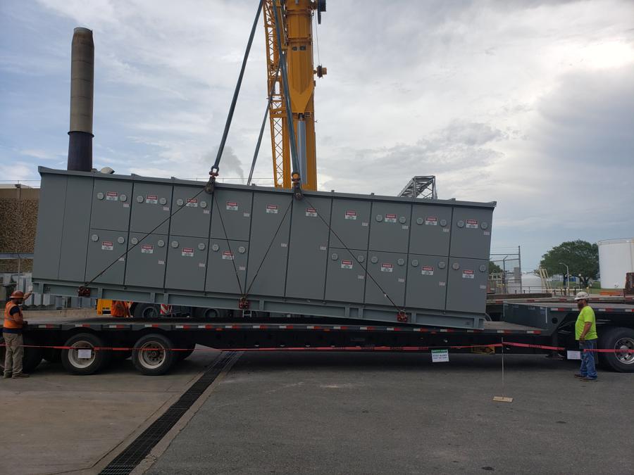 Large equipment being delivered and set at a plant site