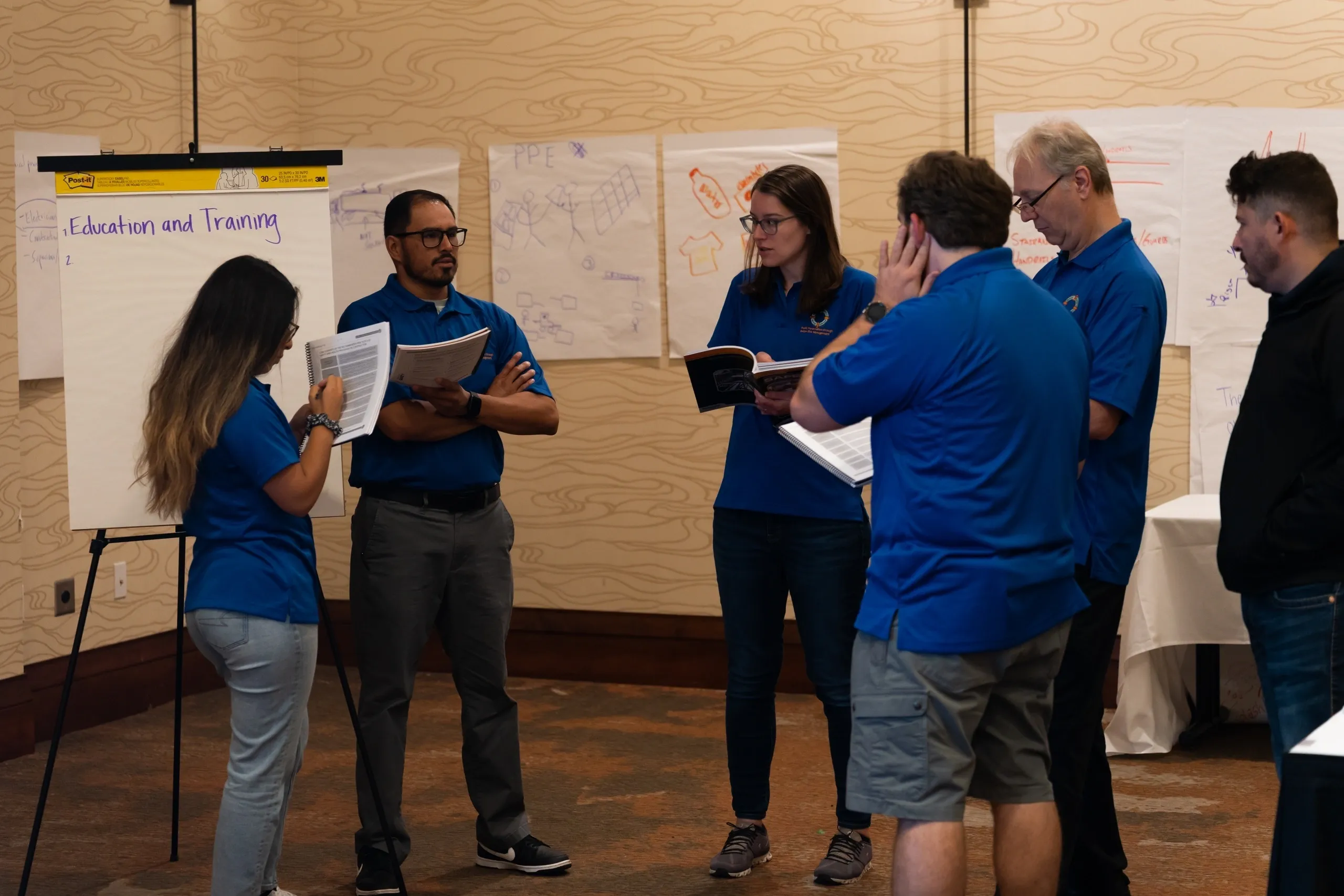 Group discussing training ideas in a room.